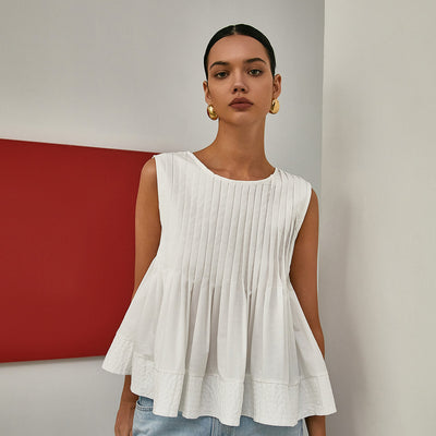Celia | Bluzka bez rękawów z plisowanym peplum